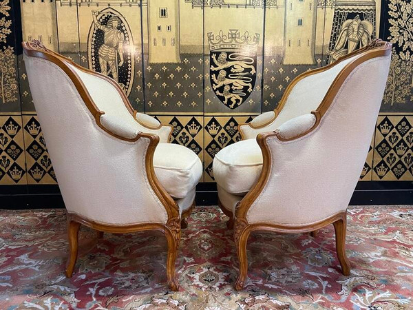Paire de fauteuils bergères gondoles de style Louis XV