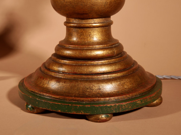 A pair of highly decorative Italian Renaissance style turned and carved giltwood floor lamps