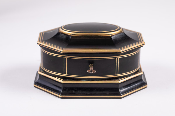 TAHAN House in Paris. Ebony and brass threaded jewelry box with cut sides