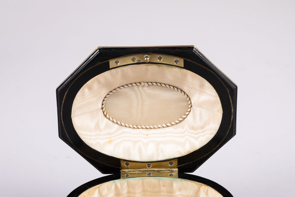 TAHAN House in Paris. Ebony and brass threaded jewelry box with cut sides