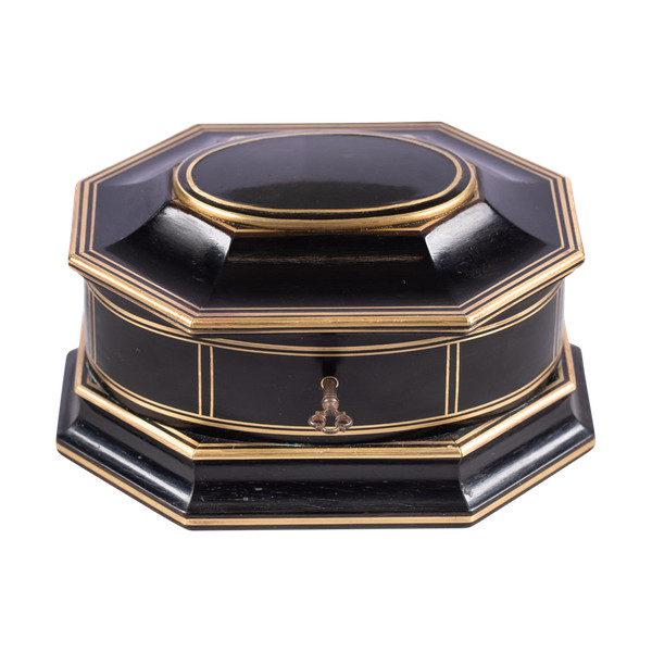 TAHAN House in Paris. Ebony and brass threaded jewelry box with cut sides
