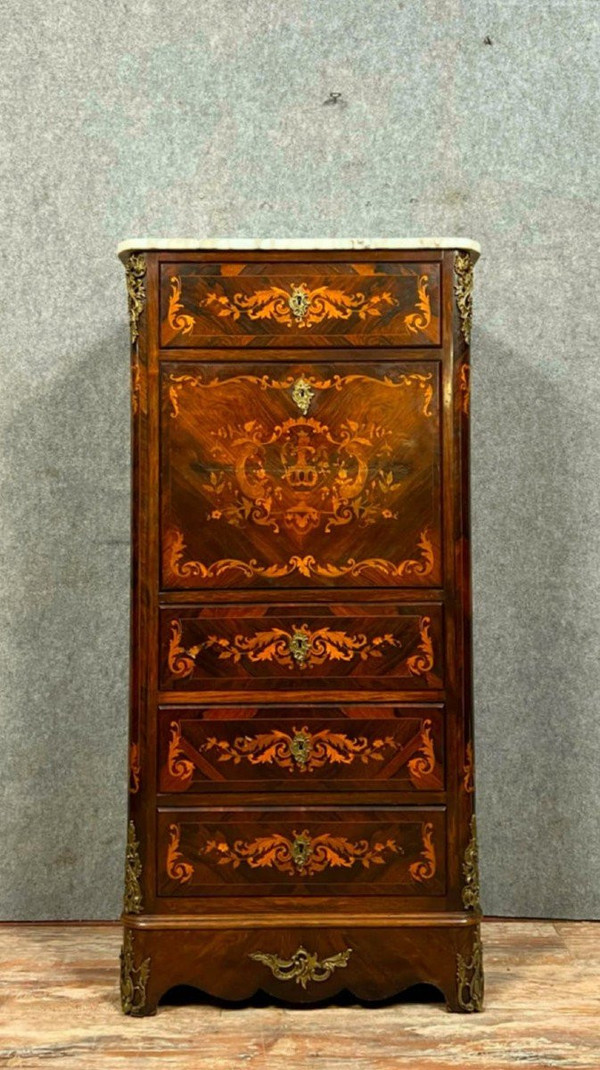 Lady's secretary in marquetry of noble woods depicting floral scrolls and a vase.