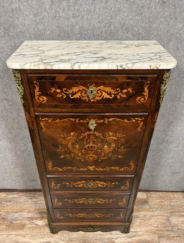 Lady's secretary in marquetry of noble woods depicting floral scrolls and a vase.