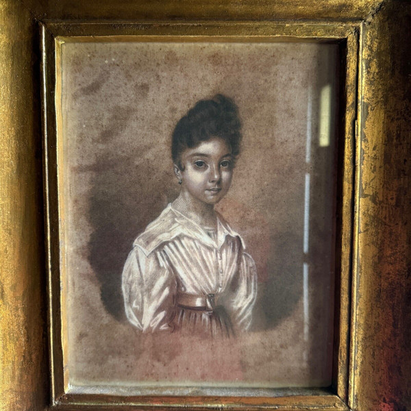 Early 19th century drawing representing a young girl in a gilded frame