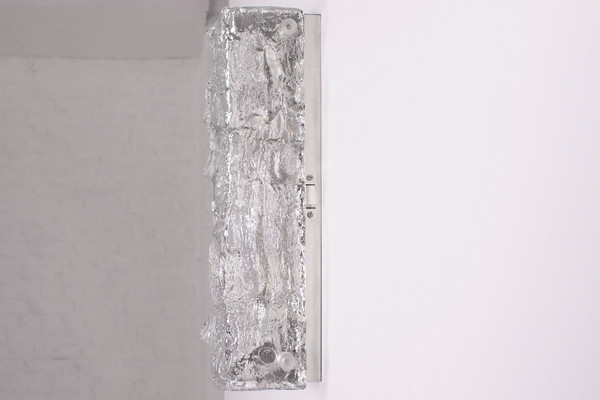 An Ice Glass bark wall sconce.