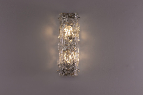 An Ice Glass bark wall sconce.