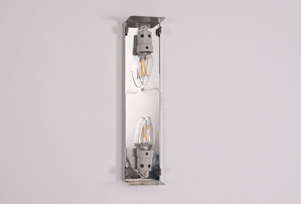 An Ice Glass bark wall sconce.