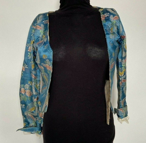 Hand-embroidered 17th or 18th century bolero jacket with floral and lace decoration