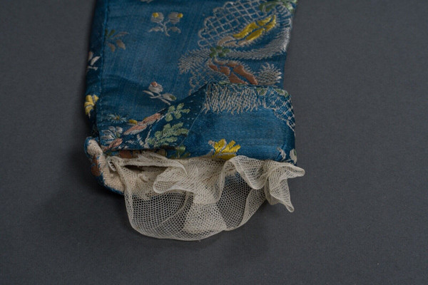 Hand-embroidered 17th or 18th century bolero jacket with floral and lace decoration