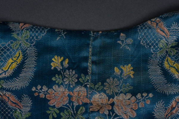 Hand-embroidered 17th or 18th century bolero jacket with floral and lace decoration