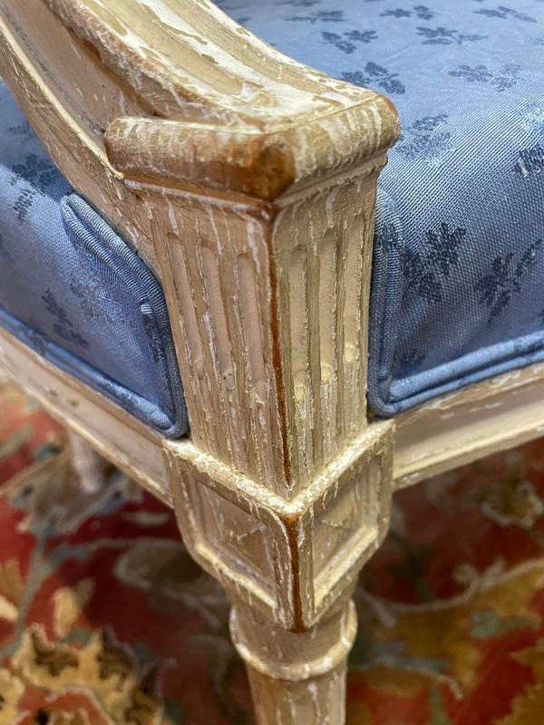 Paire de fauteuils cabriolets de style Louis XVI