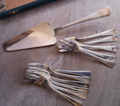 A set of silver-plated América Christofle cake servers