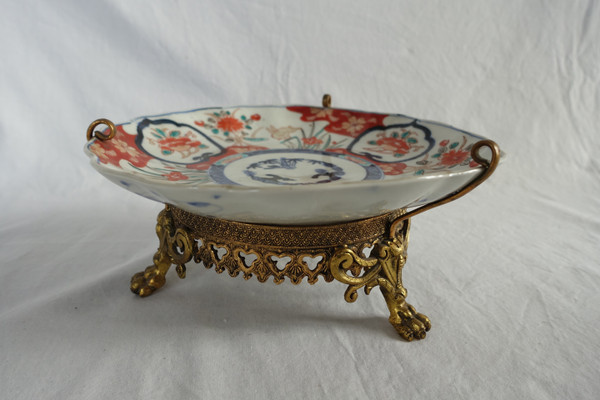 Suite of 4 Japanese porcelain bronze-mounted plates with Imari decoration