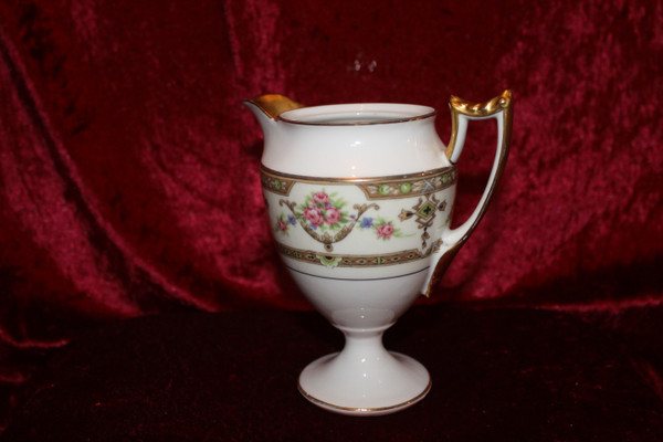 Limoges porcelain tea service with floral design, early 20th century, perfect condition
