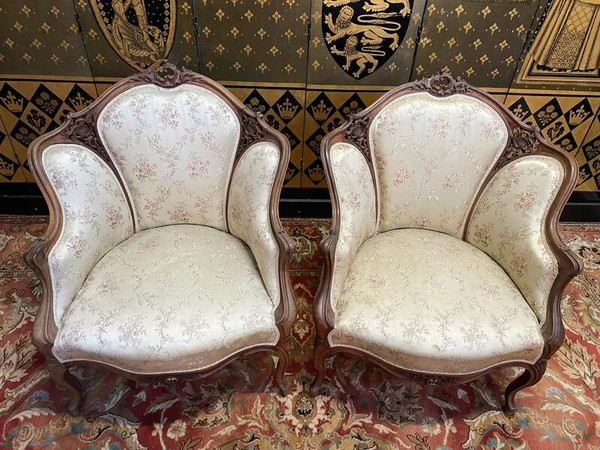 Paire de fauteuils bergères rocailles Louis XV