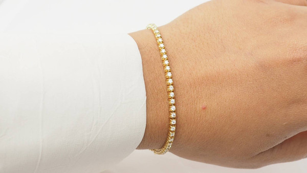 Flussarmband aus Gelbgold und Diamanten 1,50ct
