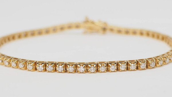 Flussarmband aus Gelbgold und Diamanten 1,50ct
