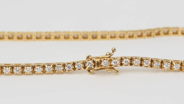 Flussarmband aus Gelbgold und Diamanten 1,50ct