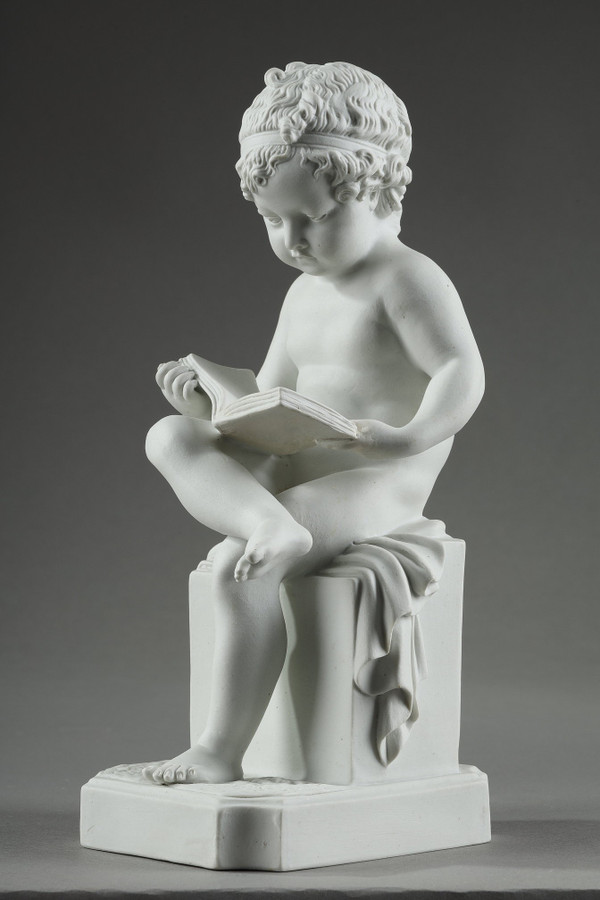 TWO SUBJECTS AT BISCUIT REPRESENTING THE CHILD READING AND THE CHILD DRAWING