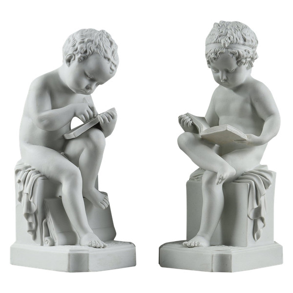 TWO SUBJECTS AT BISCUIT REPRESENTING THE CHILD READING AND THE CHILD DRAWING