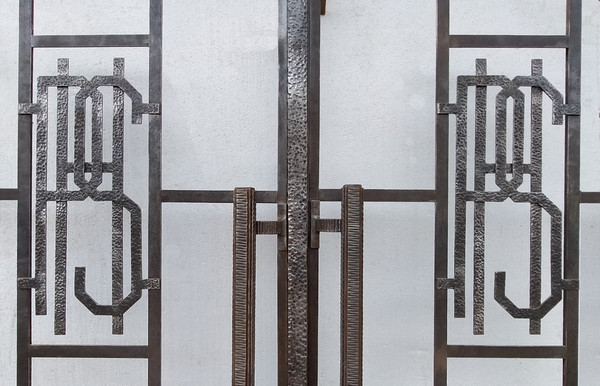 Two Exceptional Art Deco Period Arched Bay Windows in Hammered and Chiseled Wrought Iron