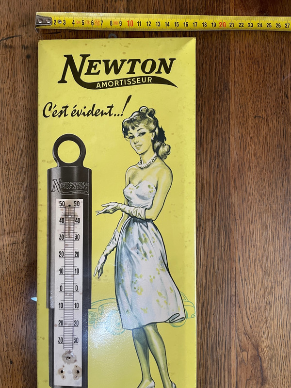 Advertisement thermometer for Newton garage shock absorbers