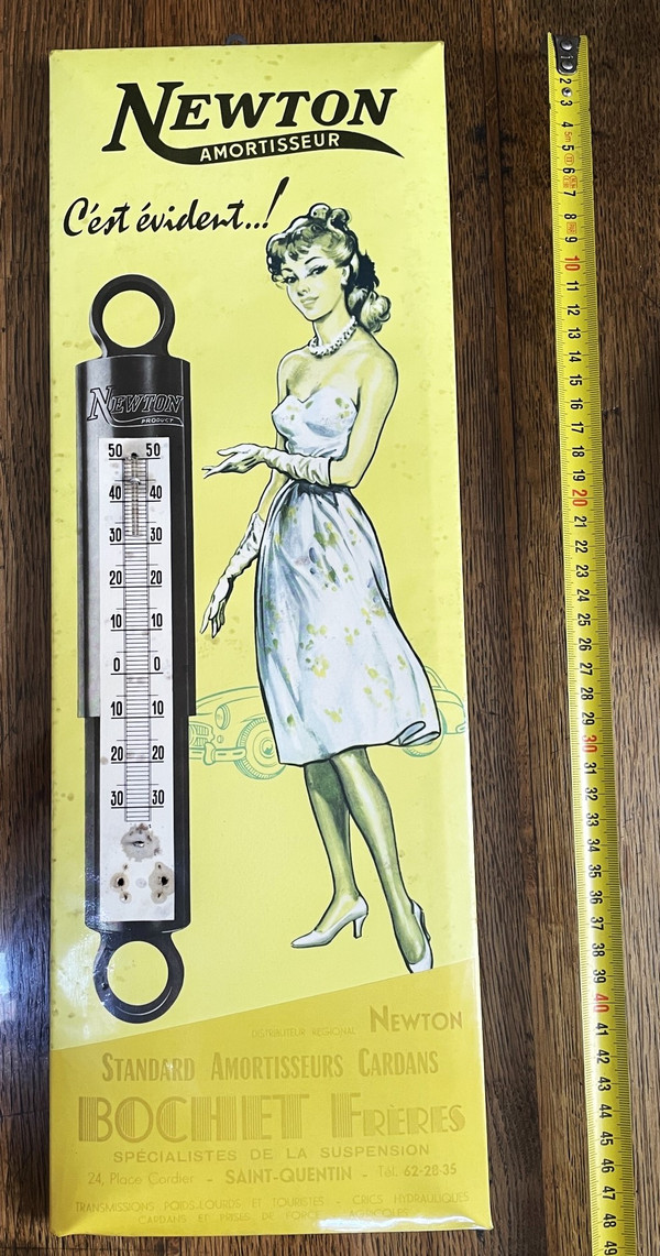 Advertisement thermometer for Newton garage shock absorbers