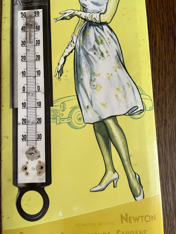 Advertisement thermometer for Newton garage shock absorbers
