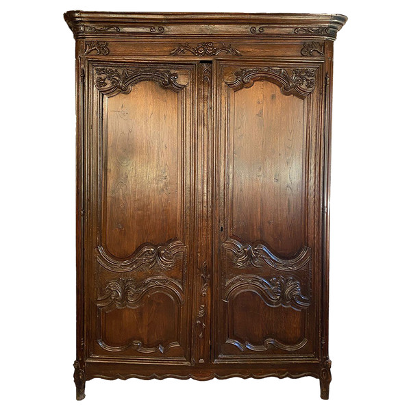 Mobile in rovere intagliato e decorato con foglie e fiori, fine XVIII secolo