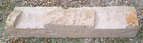 Rustic garden bench made from old stones