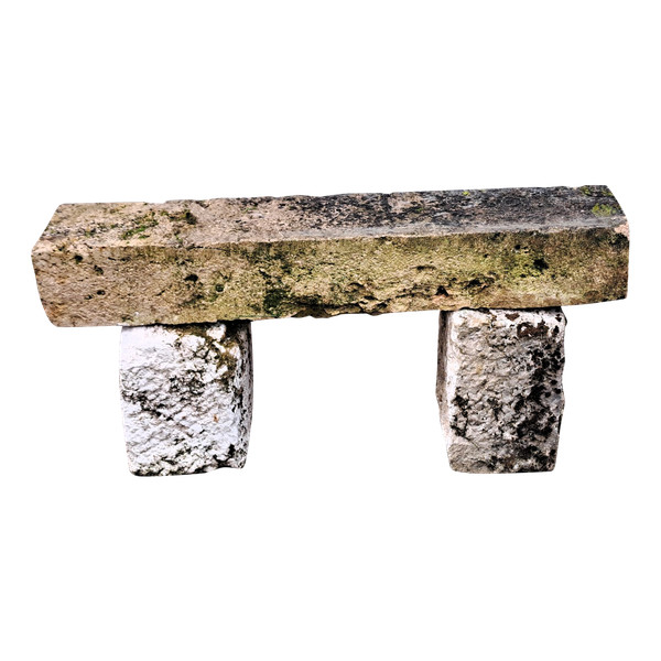 Rustic garden bench made from old stones