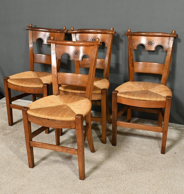 Suite von 4 Stühlen aus Kirschbaumholz, Epoche Directoire - Anfang XIX.