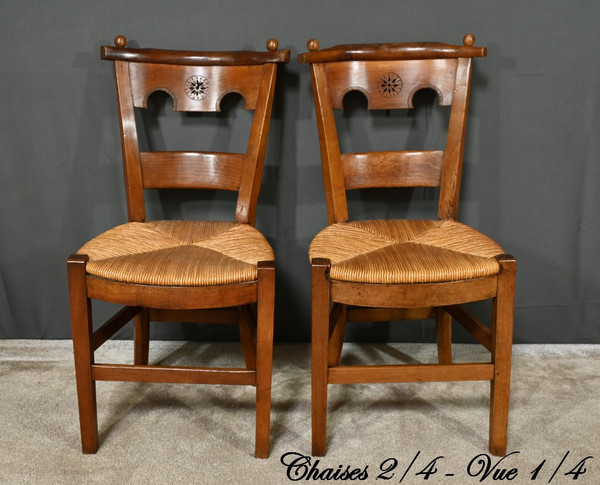 Suite von 4 Stühlen aus Kirschbaumholz, Epoche Directoire - Anfang XIX.