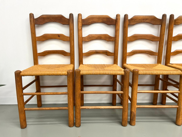 Set of 8 solid elm chairs with straw-covered seats