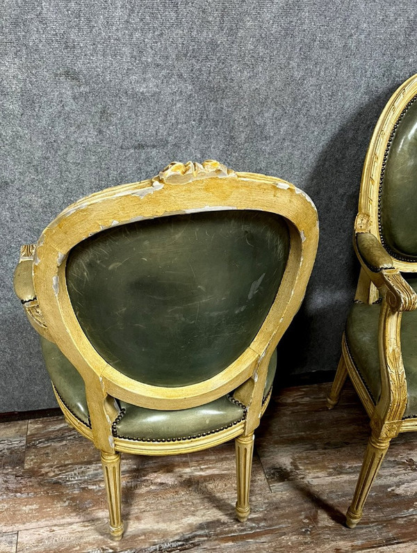 Pair of Louis XVI Cabriolet armchairs with medallion backs in ceruse wood from the 19th century