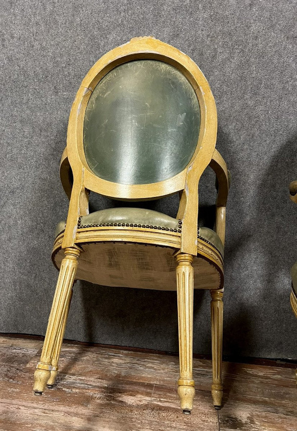 Pair of Louis XVI Cabriolet armchairs with medallion backs in ceruse wood from the 19th century