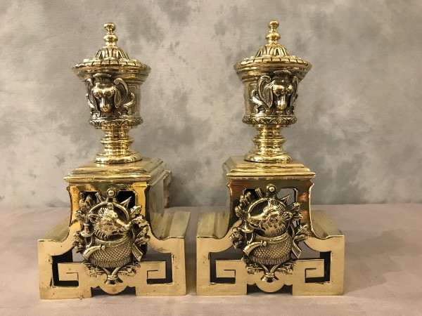 Pretty antique bronze andirons with animal decor from the 19th century