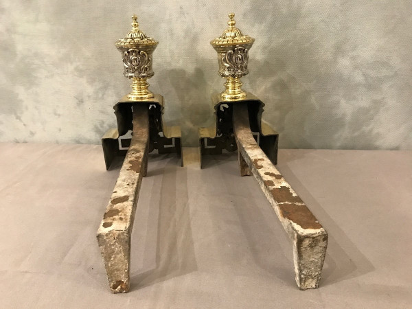 Pretty antique bronze andirons with animal decor from the 19th century