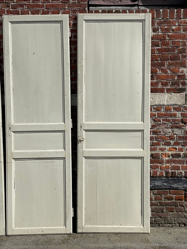 Suite of three three-panel doors