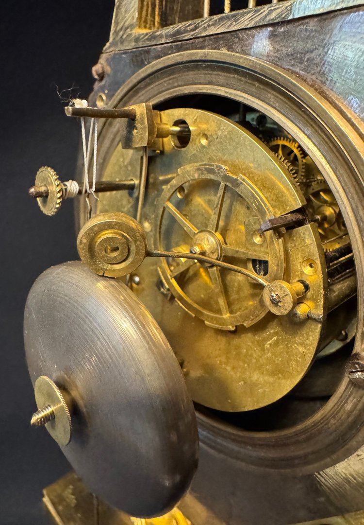 Empire period ormolu Lyre clock with dolphins