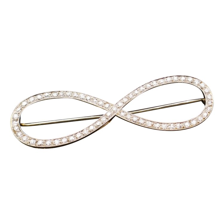 Spilla in oro bianco 18 carati e platino con diamanti.