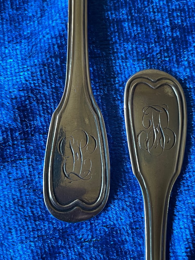 6 vermeil teaspoons.