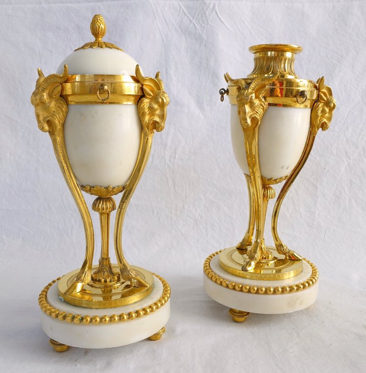 Pair of gilt bronze and marble cassolette candelabras with inverted candlesticks, Louis XVI style