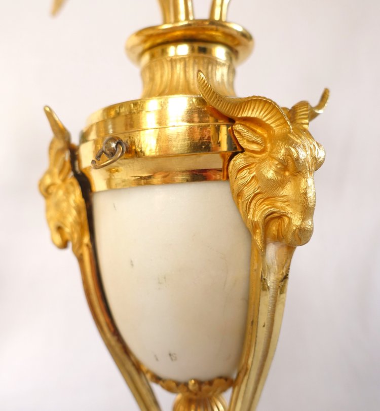 Pair of gilt bronze and marble cassolette candelabras with inverted candlesticks, Louis XVI style