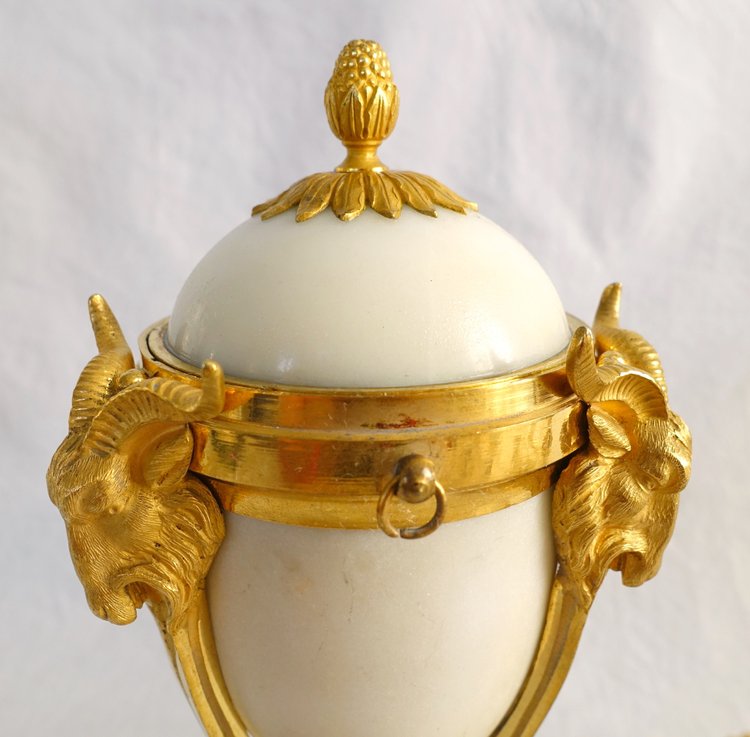Pair of gilt bronze and marble cassolette candelabras with inverted candlesticks, Louis XVI style