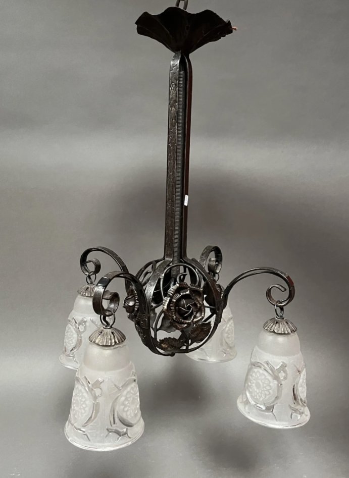 Art Deco chandelier with four molded glass tulips and wrought iron frame decorated with roses.