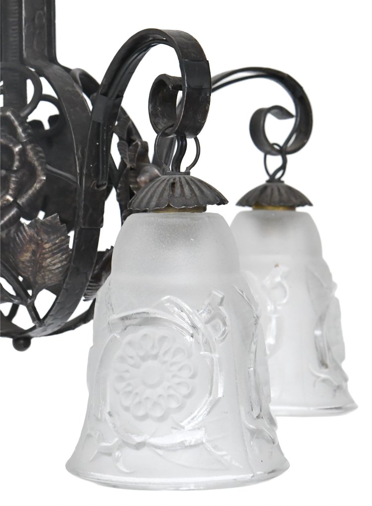 Art Deco chandelier with four molded glass tulips and wrought iron frame decorated with roses.