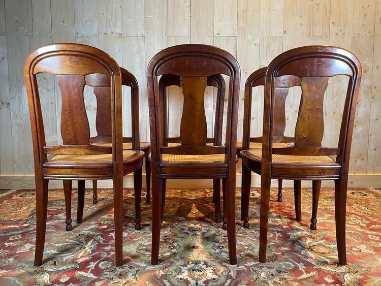 Suite mit 6 Louis-Philippe-Stühlen aus Kirschholz und Rohrgeflecht