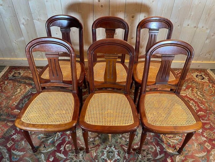 Suite mit 6 Louis-Philippe-Stühlen aus Kirschholz und Rohrgeflecht