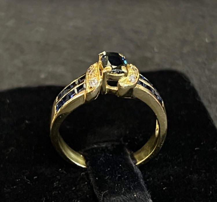 Sapphire and white stone ring